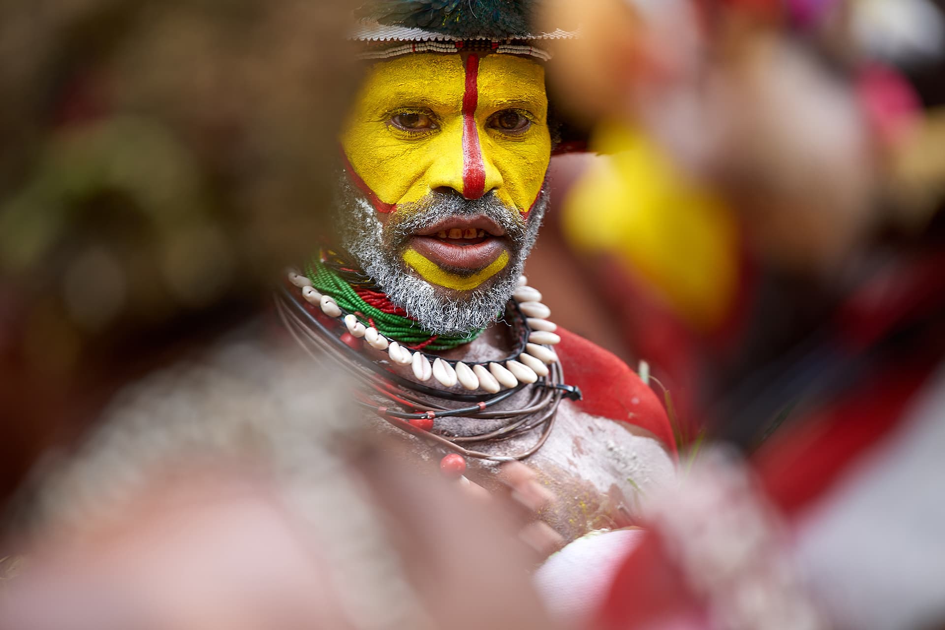 man in traditional tribal dress | EYOS